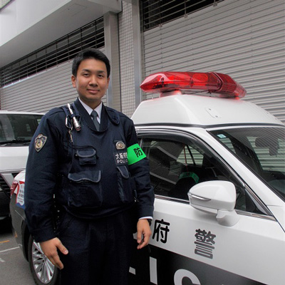 大阪電気通信大学出身の警察官の写真